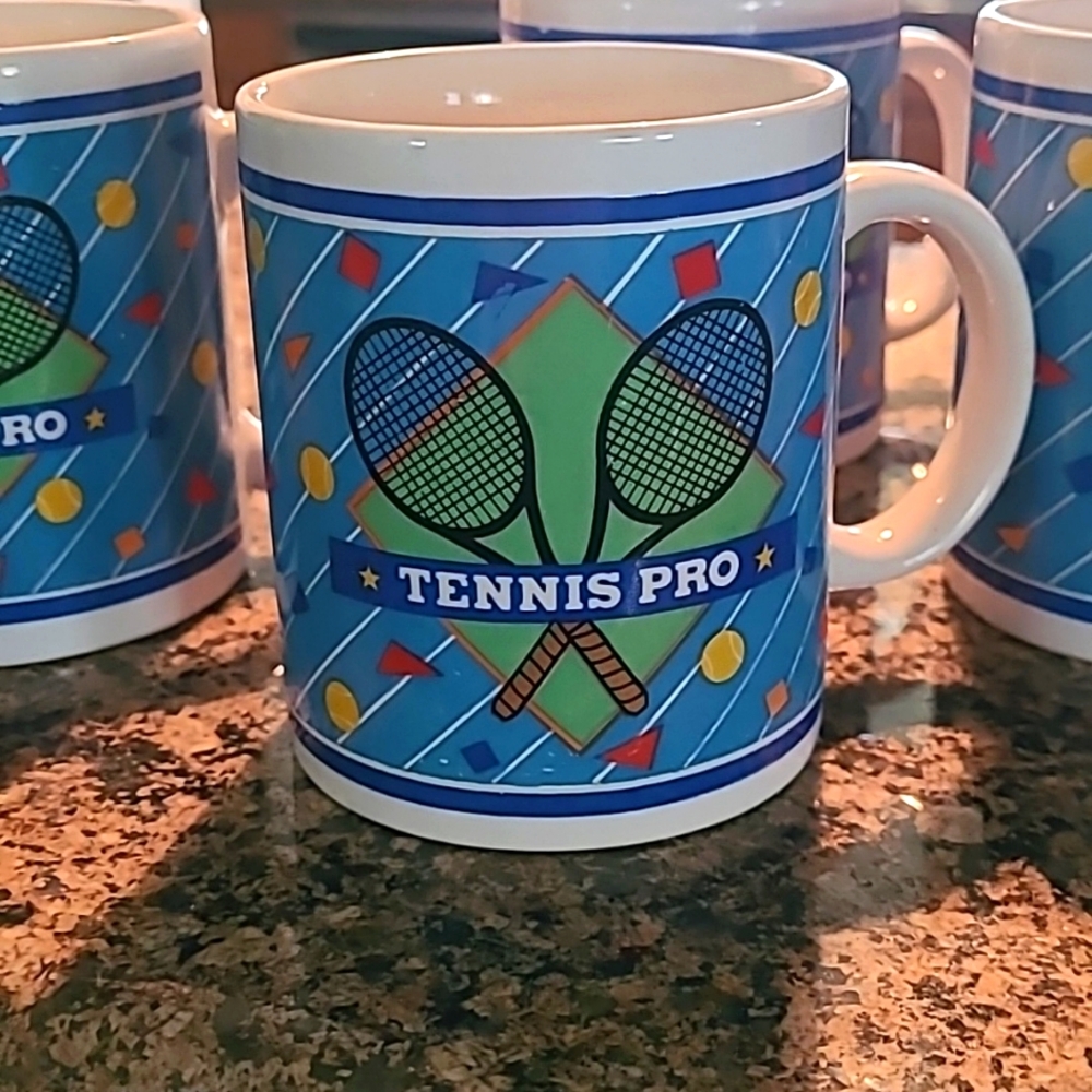 SET OF "TENNIS PRO"  MUGS AND 1 BONUS MUG BY RUSS TTL OF 5 MUGS
